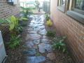 Dumaresq St. Hamilton Garden. Sandstone & Railway Sleeper Edging / Ironstone Flagstone Paths / A Variety Of Suitable Shrubs & Fruit Trees